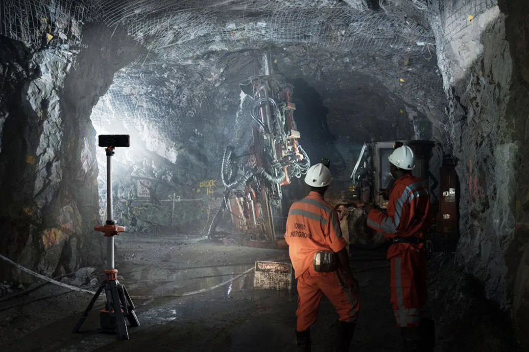 Tripod light tower inside a mine tunnel