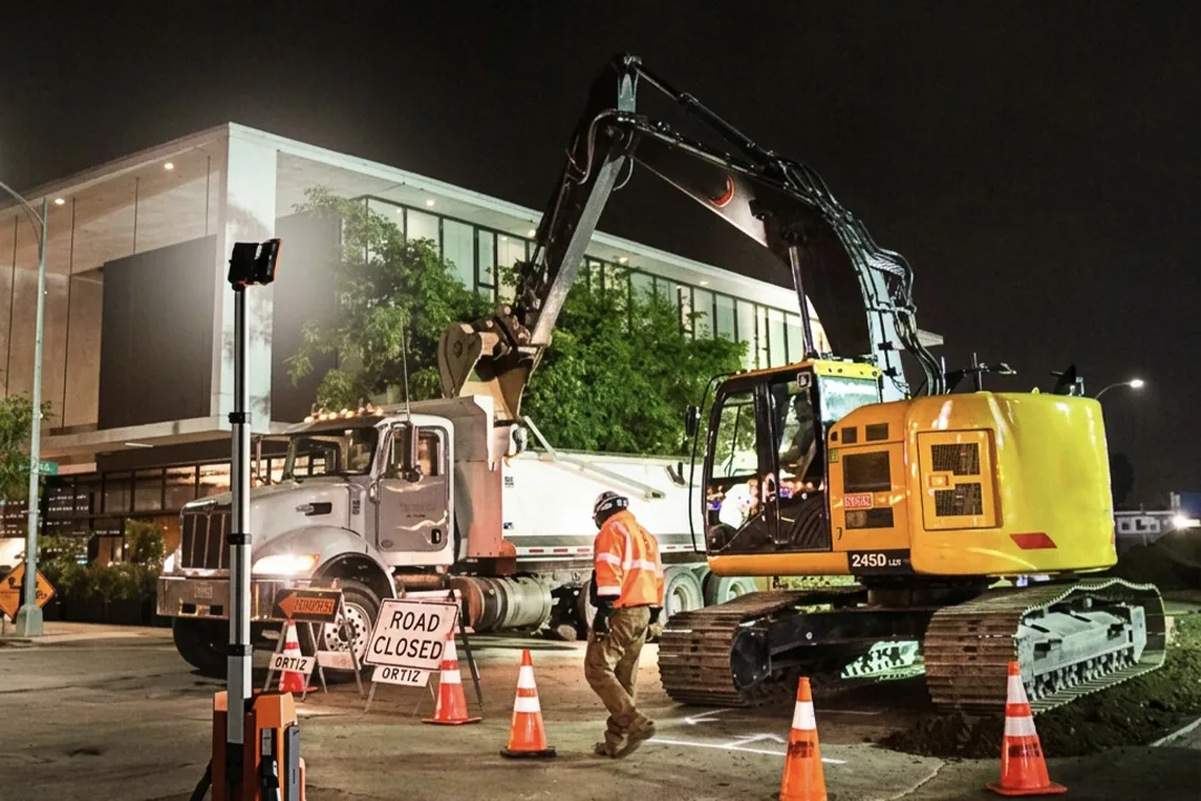 Portable light tower on a roadway work site