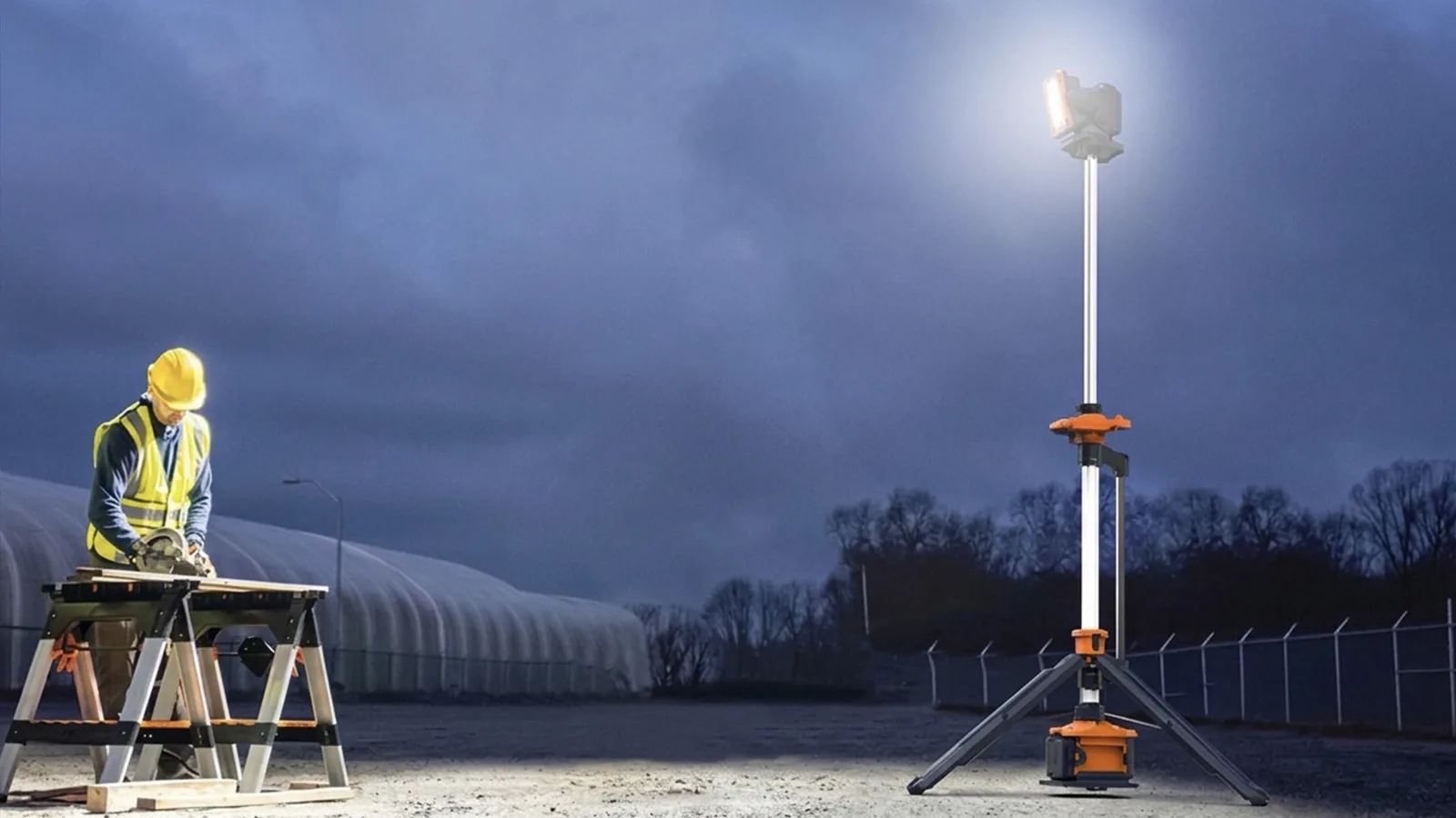 G-COMIN LED light tower lighting a jobsite at dusk